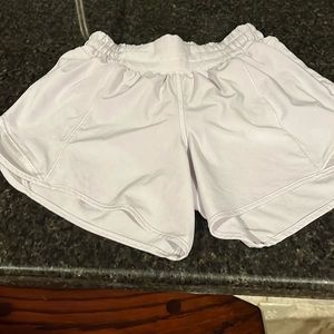 Women’s Lululemon shorts. Size 2 Tall.  Color- very faint lavender.